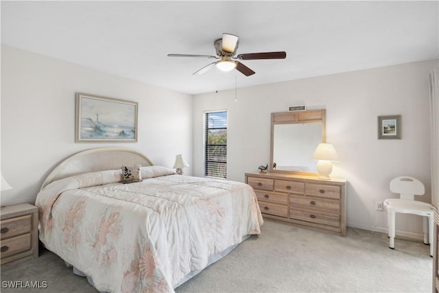 1010 SW 48th Ter Unit 102, Cape Coral, FL 33914 - bedroom featuring light colored carpet and ceiling fan