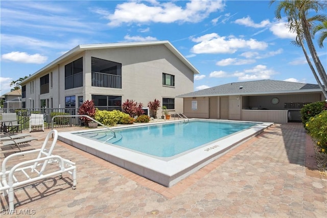 1010 SW 48th Ter Unit 102, Cape Coral, FL 33914 - community pool featuring a patio