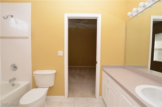 1820 SW 29th Ter, Cape Coral, FL 33914 - full bathroom featuring vanity, toilet, tile patterned flooring, tub / shower combination, and baseboards