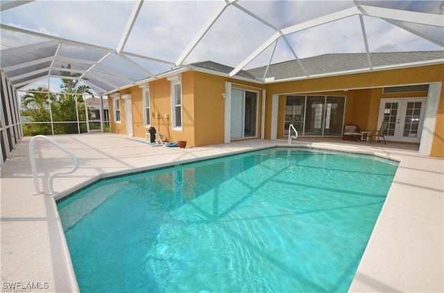 1820 SW 29th Ter, Cape Coral, FL 33914 - swimming pool with french doors, a patio, and a lanai