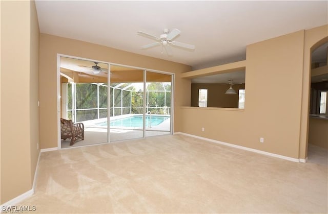 1820 SW 29th Ter, Cape Coral, FL 33914 - empty room with a ceiling fan, carpet, and a sunroom