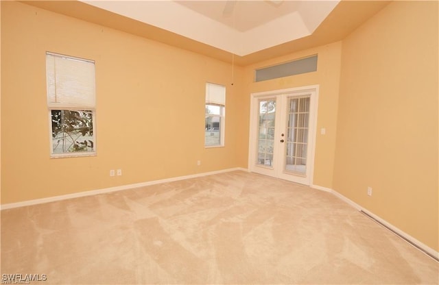 1820 SW 29th Ter, Cape Coral, FL 33914 - unfurnished room with light colored carpet, french doors, and baseboards