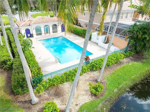 5831 Cove Cir Unit 6, Naples, FL 34119 - community pool with a fenced backyard and a patio area