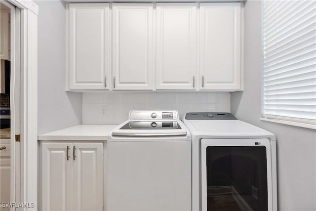 5831 Cove Cir Unit 6, Naples, FL 34119 - washroom featuring cabinet space and washer and dryer