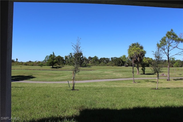 1530 NW 25th Ave, Cape Coral, FL 33993 - view of home's community featuring a yard and view of golf course