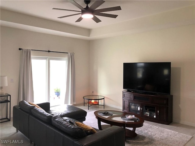 1530 NW 25th Ave, Cape Coral, FL 33993 - living room featuring ceiling fan, light tile patterned flooring, and baseboards