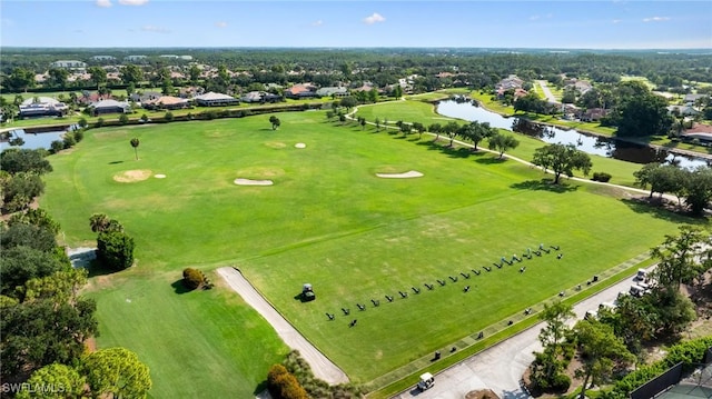 8241 Glenfinnan Cir, Fort Myers, FL 33912 - aerial perspective of suburban area featuring a nearby body of water and a golf club