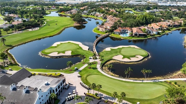 8241 Glenfinnan Cir, Fort Myers, FL 33912 - aerial view of property and surrounding area featuring a golf course, a large body of water, and nearby suburban area