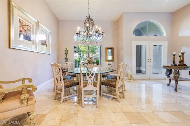 8241 Glenfinnan Cir, Fort Myers, FL 33912 - dining room with plenty of natural light, a chandelier, french doors, and light marble finish flooring