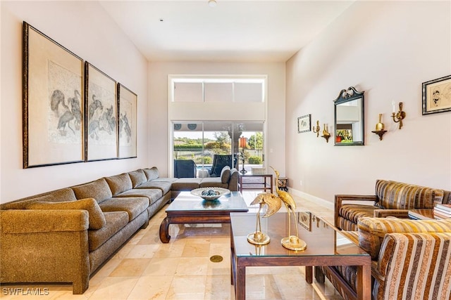 8241 Glenfinnan Cir, Fort Myers, FL 33912 - living area featuring a towering ceiling