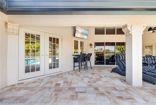 8241 Glenfinnan Cir, Fort Myers, FL 33912 - view of patio with french doors