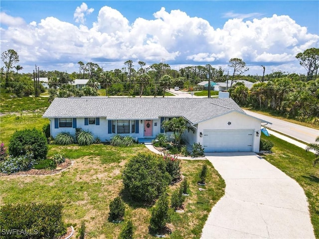 7690 Castleberry Ter, Englewood, FL 34224 - single story home featuring a garage, driveway, stucco siding, and a front lawn