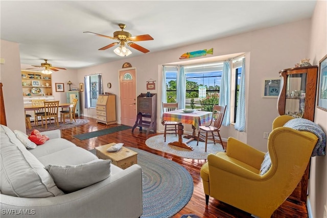 7690 Castleberry Ter, Englewood, FL 34224 - living area featuring wood finished floors and a ceiling fan