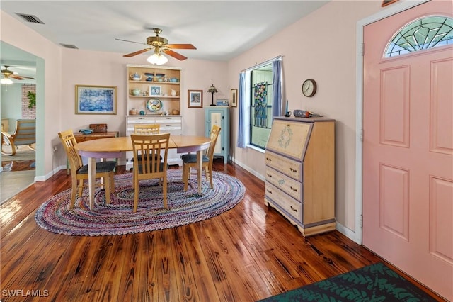 7690 Castleberry Ter, Englewood, FL 34224 - dining room with a ceiling fan, wood finished floors, and baseboards
