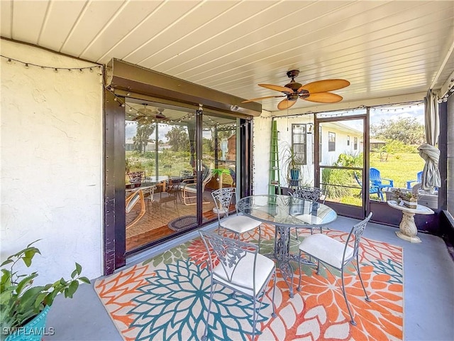 7690 Castleberry Ter, Englewood, FL 34224 - sunroom / solarium with a ceiling fan and outdoor dining space