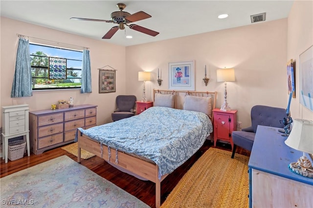 7690 Castleberry Ter, Englewood, FL 34224 - bedroom featuring wood finished floors, a ceiling fan, and recessed lighting