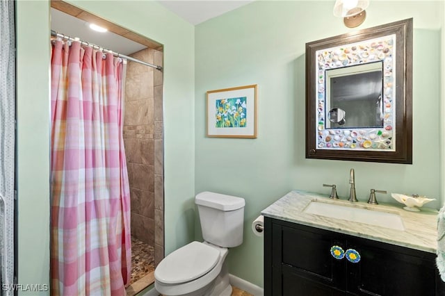 7690 Castleberry Ter, Englewood, FL 34224 - full bathroom with toilet, vanity, and tiled shower