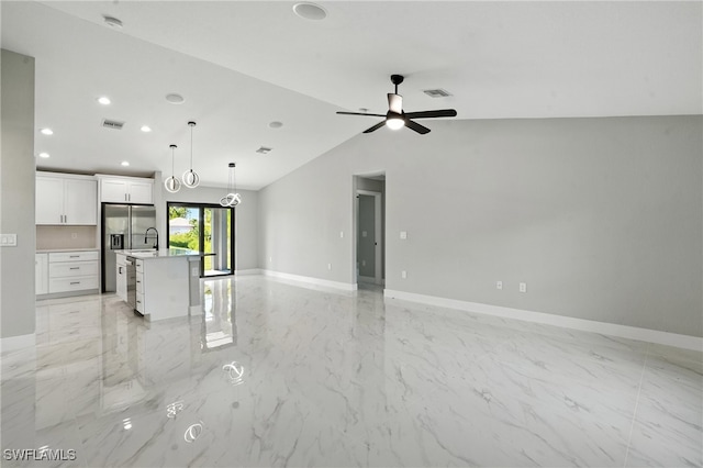 4011 7th St SW, Lehigh Acres, FL 33976 - unfurnished living room with light marble finish flooring, recessed lighting, ceiling fan, and lofted ceiling
