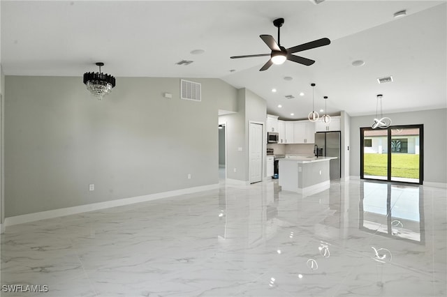 4011 7th St SW, Lehigh Acres, FL 33976 - unfurnished living room featuring light marble finish floors, ceiling fan, vaulted ceiling, a chandelier, and recessed lighting