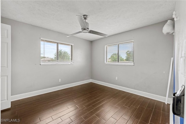 1311 SE 11th St, Cape Coral, FL 33990 - unfurnished room featuring healthy amount of natural light, ceiling fan, baseboards, wood finished floors, and a textured ceiling