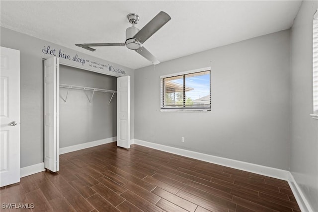 1311 SE 11th St, Cape Coral, FL 33990 - unfurnished bedroom featuring baseboards, a closet, and wood finished floors