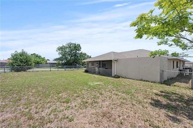 1311 SE 11th St, Cape Coral, FL 33990 - view of yard with a sunroom
