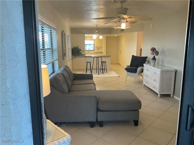 6897 Estero Blvd Unit 166, Fort Myers Beach, FL 33931 - living room featuring light tile patterned floors and a ceiling fan