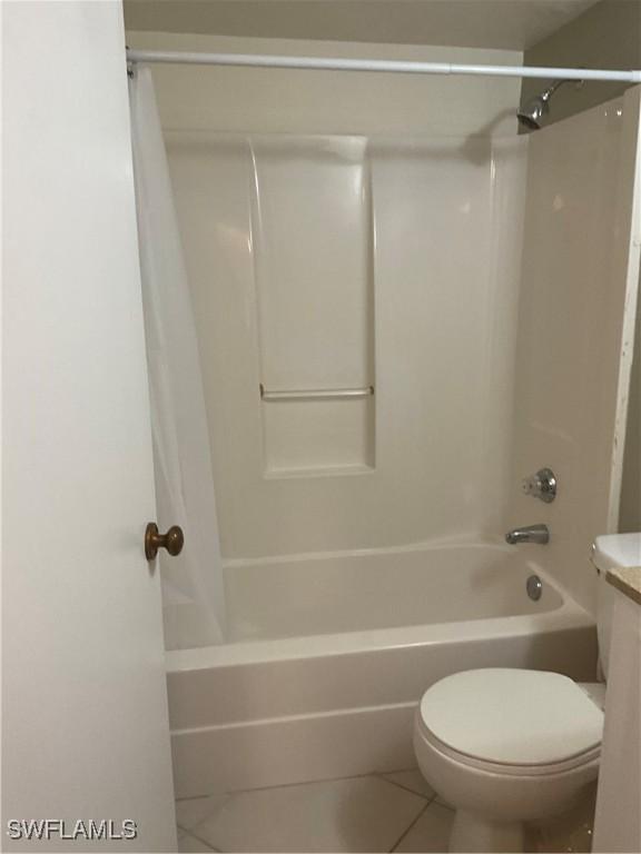 6897 Estero Blvd Unit 166, Fort Myers Beach, FL 33931 - bathroom featuring shower / tub combo and tile patterned floors