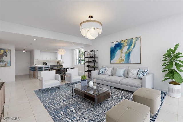 900 8th Ave S Unit 102, Naples, FL 34102 - living room with light tile patterned floors, a chandelier, baseboards, and recessed lighting
