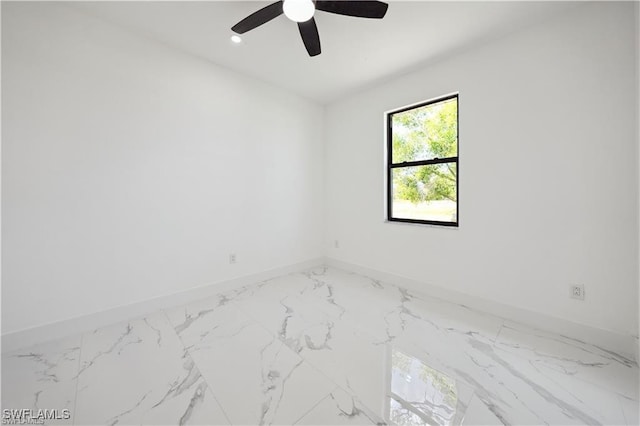 4309 NW 38th Ave, Cape Coral, FL 33993 - empty room with baseboards, marble look tiles, a ceiling fan, and recessed lighting