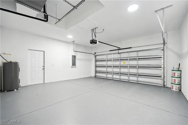 4309 NW 38th Ave, Cape Coral, FL 33993 - garage featuring water heater, electric panel, a garage door opener, and recessed lighting