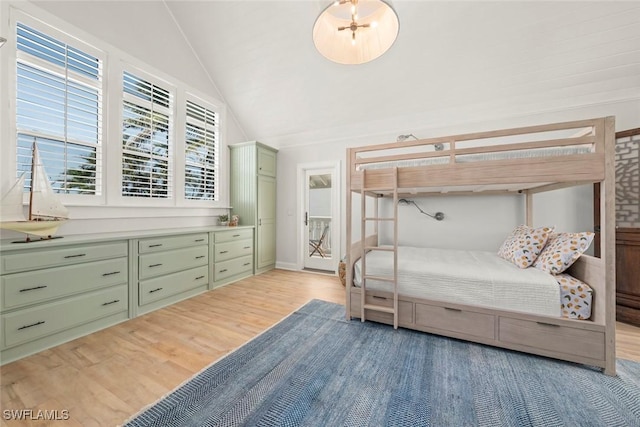 15009 Binder Dr, Captiva, FL 33924 - bedroom with light wood-style flooring and lofted ceiling