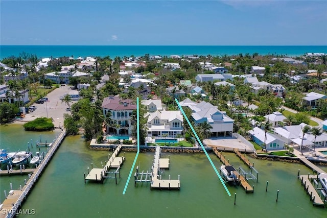 15009 Binder Dr, Captiva, FL 33924 - aerial view of residential area with a large body of water