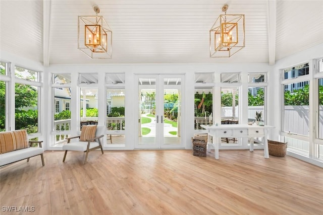 15009 Binder Dr, Captiva, FL 33924 - sunroom with a chandelier, french doors, and wood finished floors