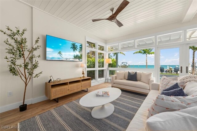 15009 Binder Dr, Captiva, FL 33924 - living area featuring light wood finished floors, baseboards, a ceiling fan, and wood ceiling