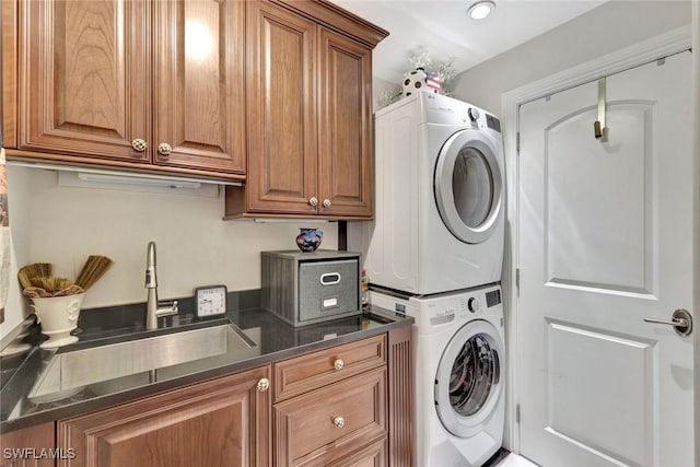 1920 Virginia Ave Unit 1602, Fort Myers, FL 33901 - laundry room with stacked washing machine and dryer and cabinet space