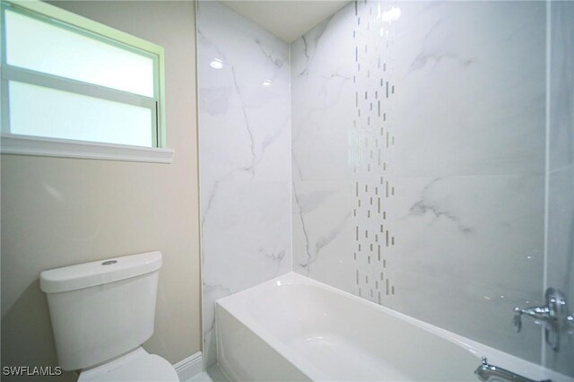 1893 Weldon Ave, Lehigh Acres, FL 33972 - bathroom with toilet and shower / washtub combination