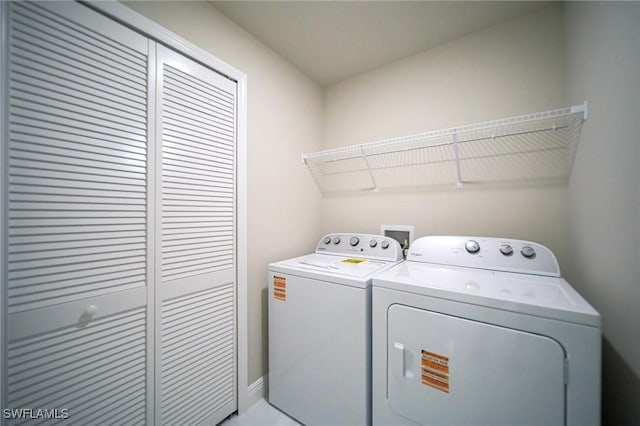 1893 Weldon Ave, Lehigh Acres, FL 33972 - washroom with washer and clothes dryer