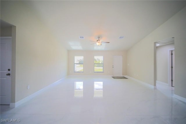1893 Weldon Ave, Lehigh Acres, FL 33972 - unfurnished living room with a ceiling fan and baseboards