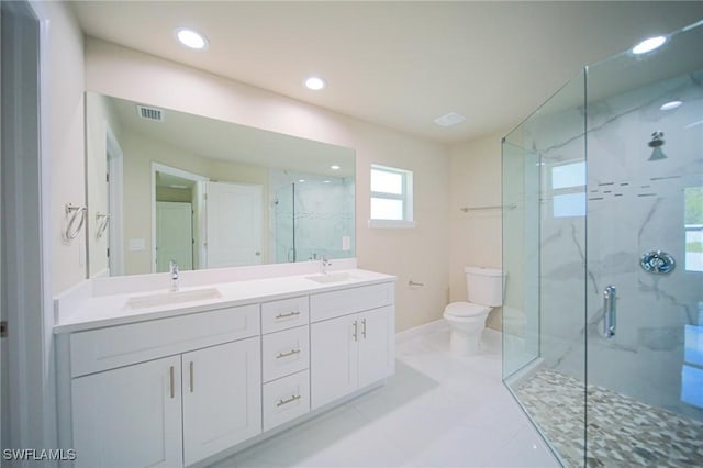 1893 Weldon Ave, Lehigh Acres, FL 33972 - bathroom featuring a marble finish shower, double vanity, toilet, baseboards, and recessed lighting