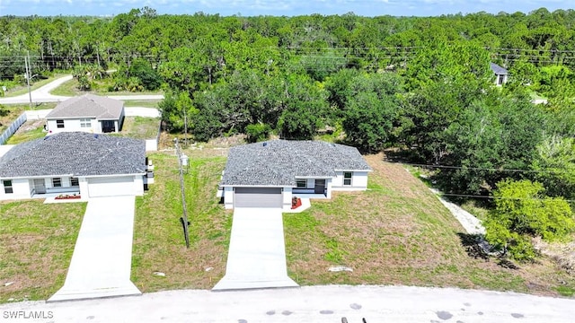 1895 Weldon Ave, Lehigh Acres, FL 33972 - view from above of property with a forest