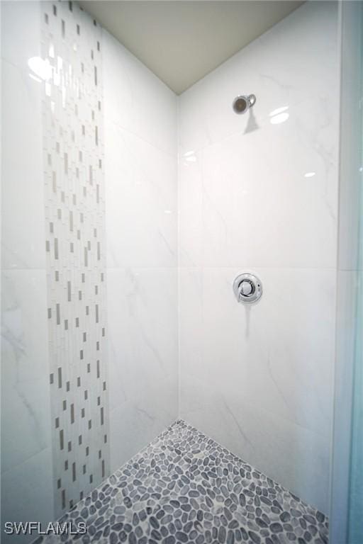 1895 Weldon Ave, Lehigh Acres, FL 33972 - full bathroom with a tile shower