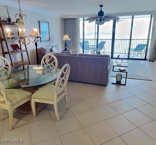 17170 Harbour Point Dr Unit 736, Fort Myers, FL 33908 - dining area featuring healthy amount of natural light, ceiling fan, ornamental molding, and light tile patterned floors