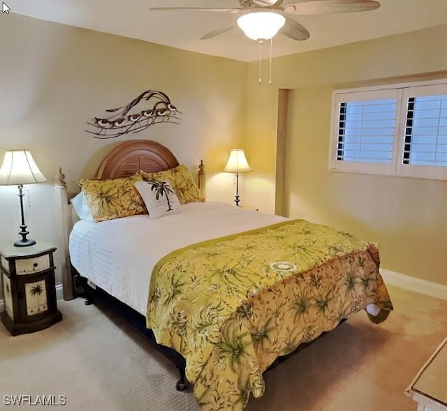 17170 Harbour Point Dr Unit 736, Fort Myers, FL 33908 - carpeted bedroom featuring a ceiling fan and baseboards