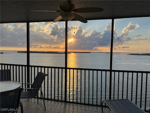 17170 Harbour Point Dr Unit 736, Fort Myers, FL 33908 - sunroom / solarium with a water view