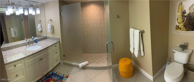 17170 Harbour Point Dr Unit 736, Fort Myers, FL 33908 - bathroom featuring a stall shower, vanity, baseboards, tile patterned flooring, and toilet