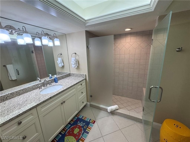 17170 Harbour Point Dr Unit 736, Fort Myers, FL 33908 - bathroom with a shower stall, tile patterned flooring, vanity, and baseboards