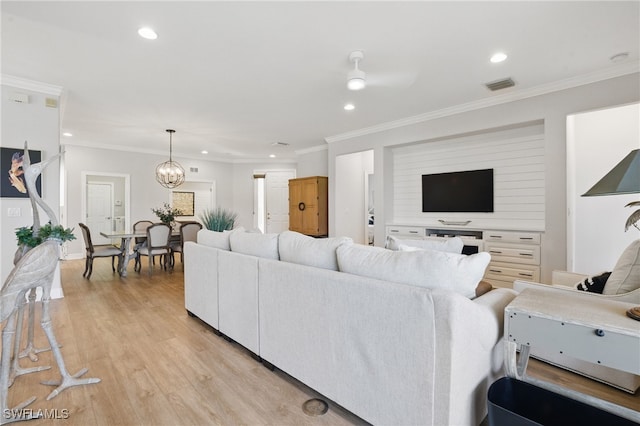28657 San Lucas Ln Unit 102, Bonita Springs, FL 34135 - living area featuring a chandelier, ornamental molding, light wood-type flooring, and recessed lighting