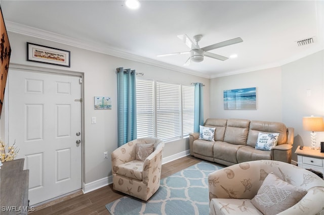 2608 NW 25th Ave, Cape Coral, FL 33993 - living room with ornamental molding, ceiling fan, baseboards, wood finished floors, and recessed lighting