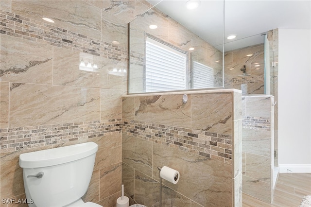 2608 NW 25th Ave, Cape Coral, FL 33993 - full bath with walk in shower, toilet, tile walls, and recessed lighting